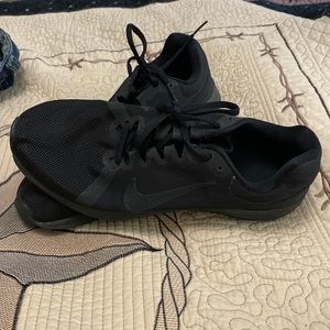 Black Nike running shoes
